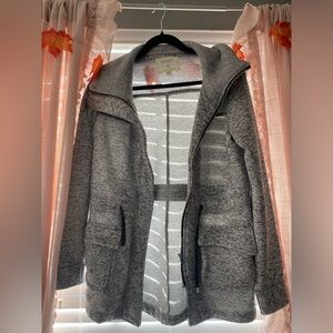 This is a fleece-lined jacket, size small, brand is ‘Ashley 26 international’